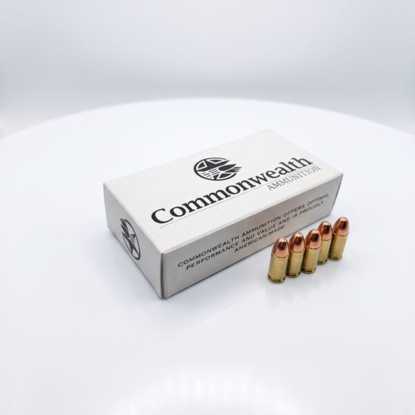 Commonwealth Ammunition 9mm 115gr CMJ cartridges standing in front of box on clean white background