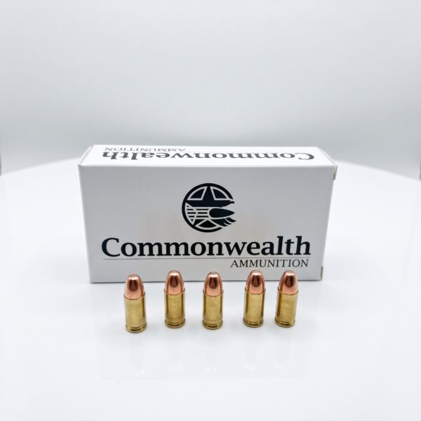 Commonwealth Ammunition 9mm 147 grain CMJ Subsonic cartridges standing in front of box on clean white background.